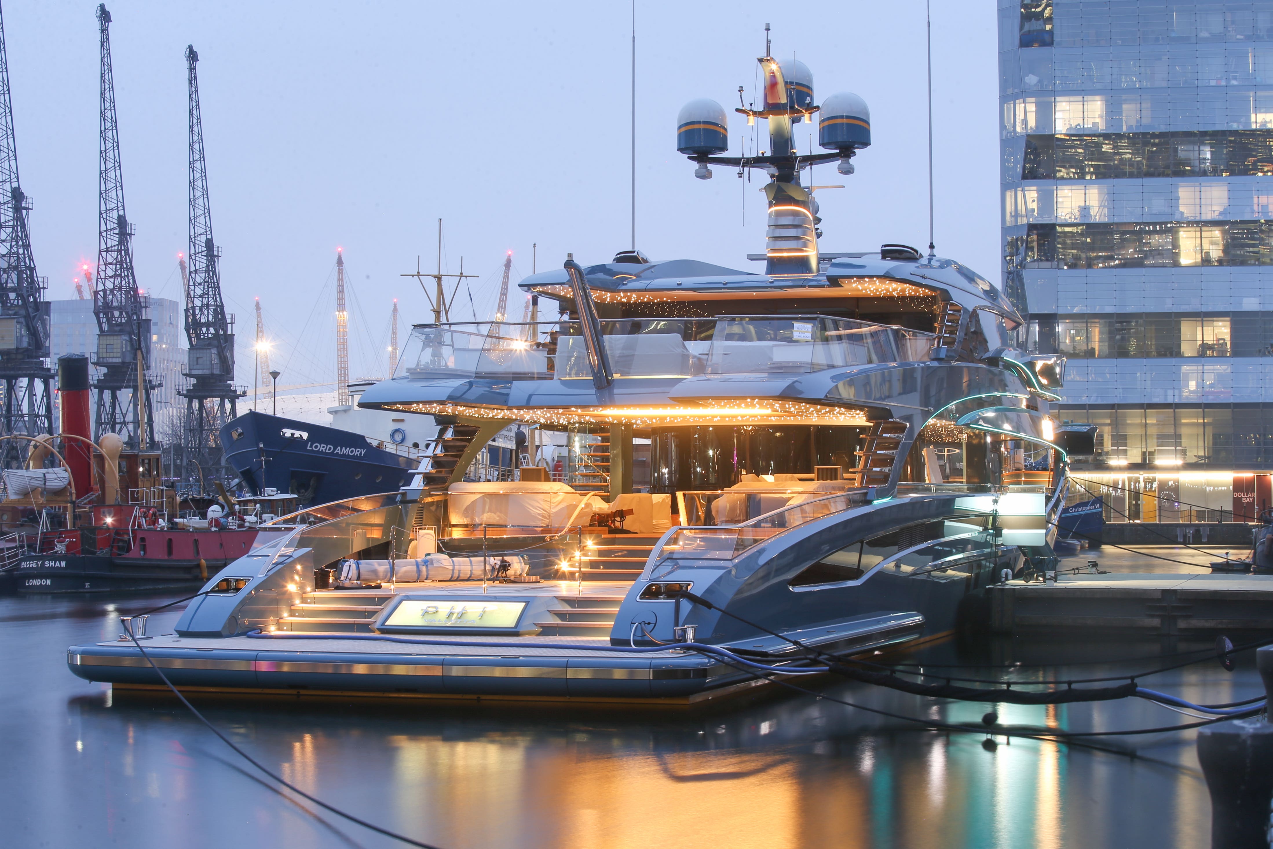 Superyacht the Phi in Canary Wharf, east London, detained as part of sanctions against Russia (James Manning/PA)