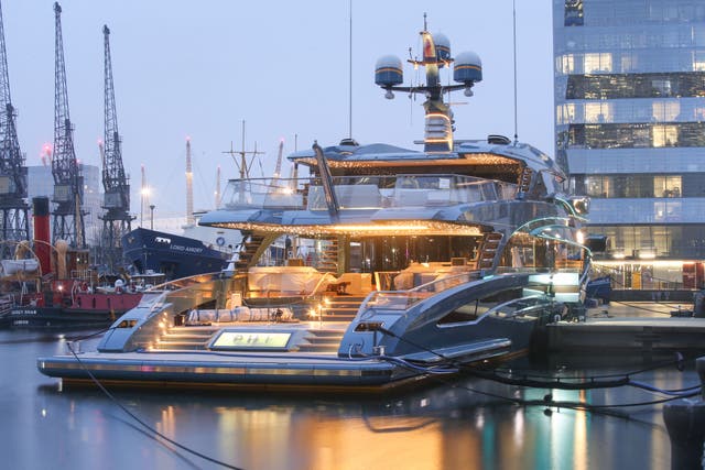 Superyacht the Phi in Canary Wharf, east London, detained as part of sanctions against Russia (James Manning/PA)