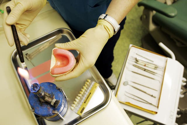 Dentists on the same contract as junior doctors in Scotland have backed industrial action (Andrew Milligan/PA)