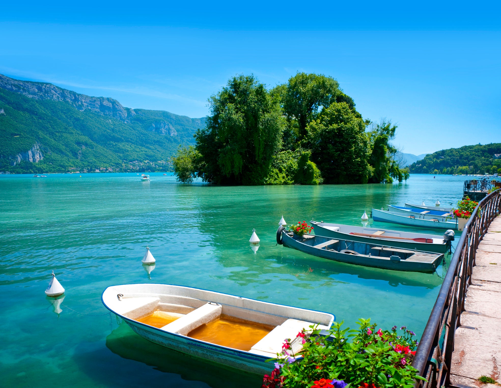 Lake Annecy offers clear water surrounded by mountain views