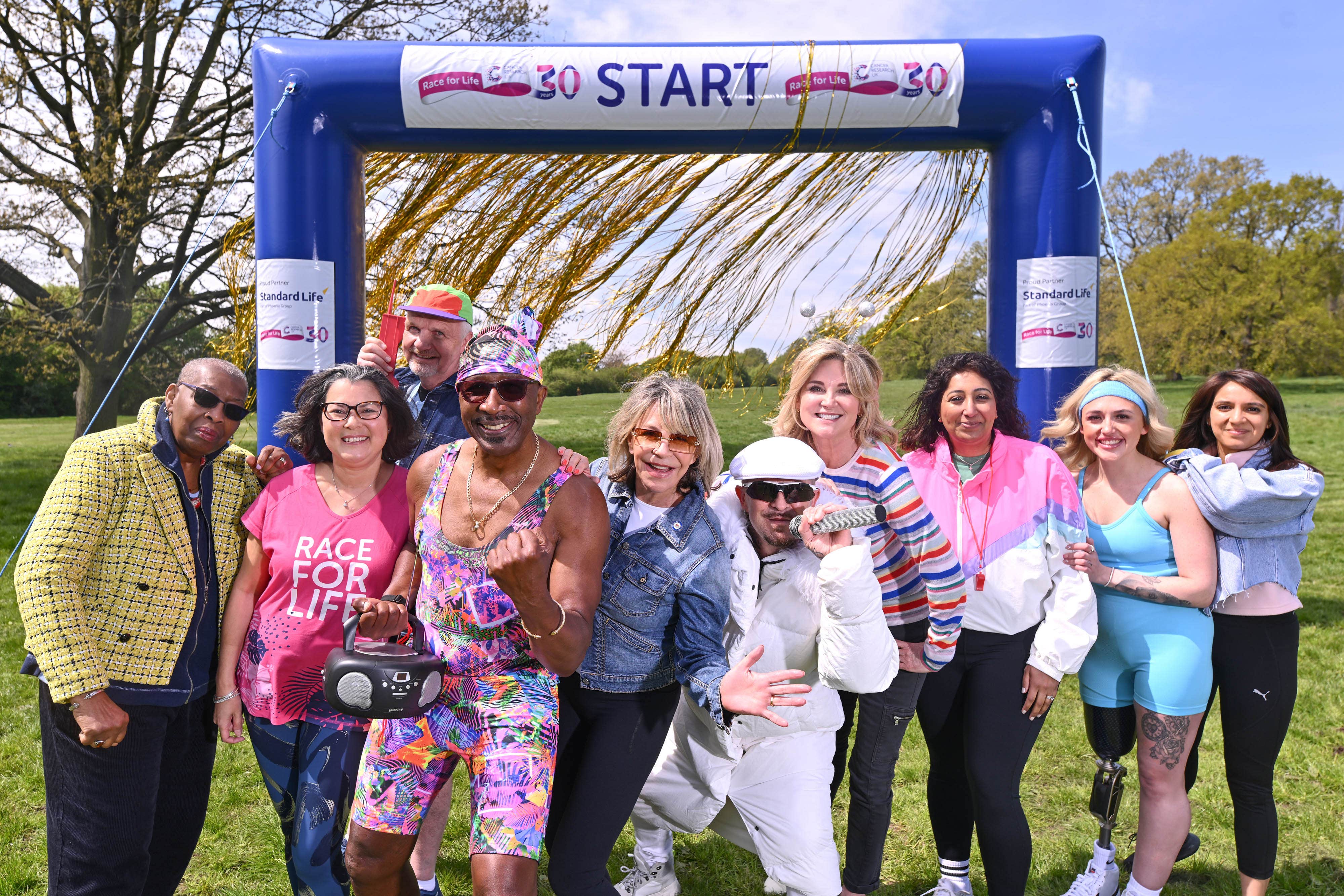 Chantelle Cox, second from right, with celebrities including Mr Motivator, Anthea Turner, Leslie Ash and Terry Coldwell (Matt Crossick/PA)