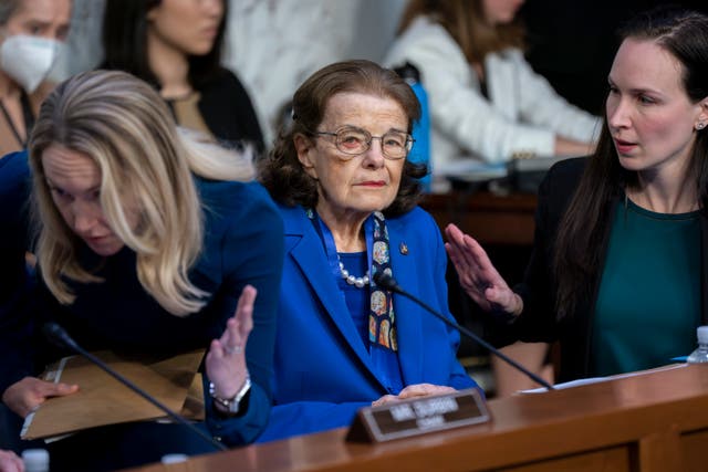 <p>FILE-Sen. Dianne Feinstein, D-Calif., is flanked by aides as she returns to the Senate Judiciary Committee following a more than ten-week long absence </p>