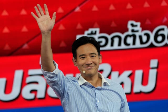 <p>FILE-Move Forward Party leader Pita Limjaroenrat waves to his supporters</p>