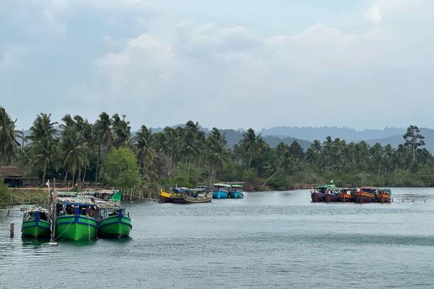 This picture shows fishing boats anchored near Gwa township in Myanmar’s Rakhine state on 11 May 2023 after Cyclone Mocha, the Bay of Bengal’s first cyclone of the year formed