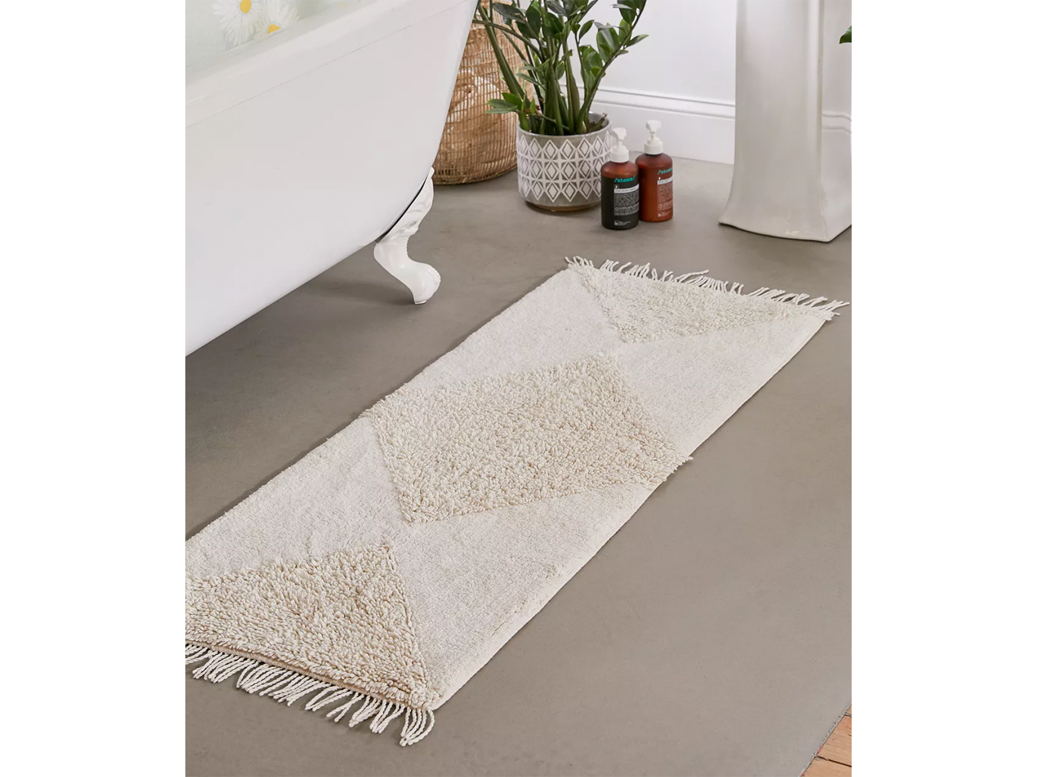Urban Outfitters looped beige geometric runner bath mat.png