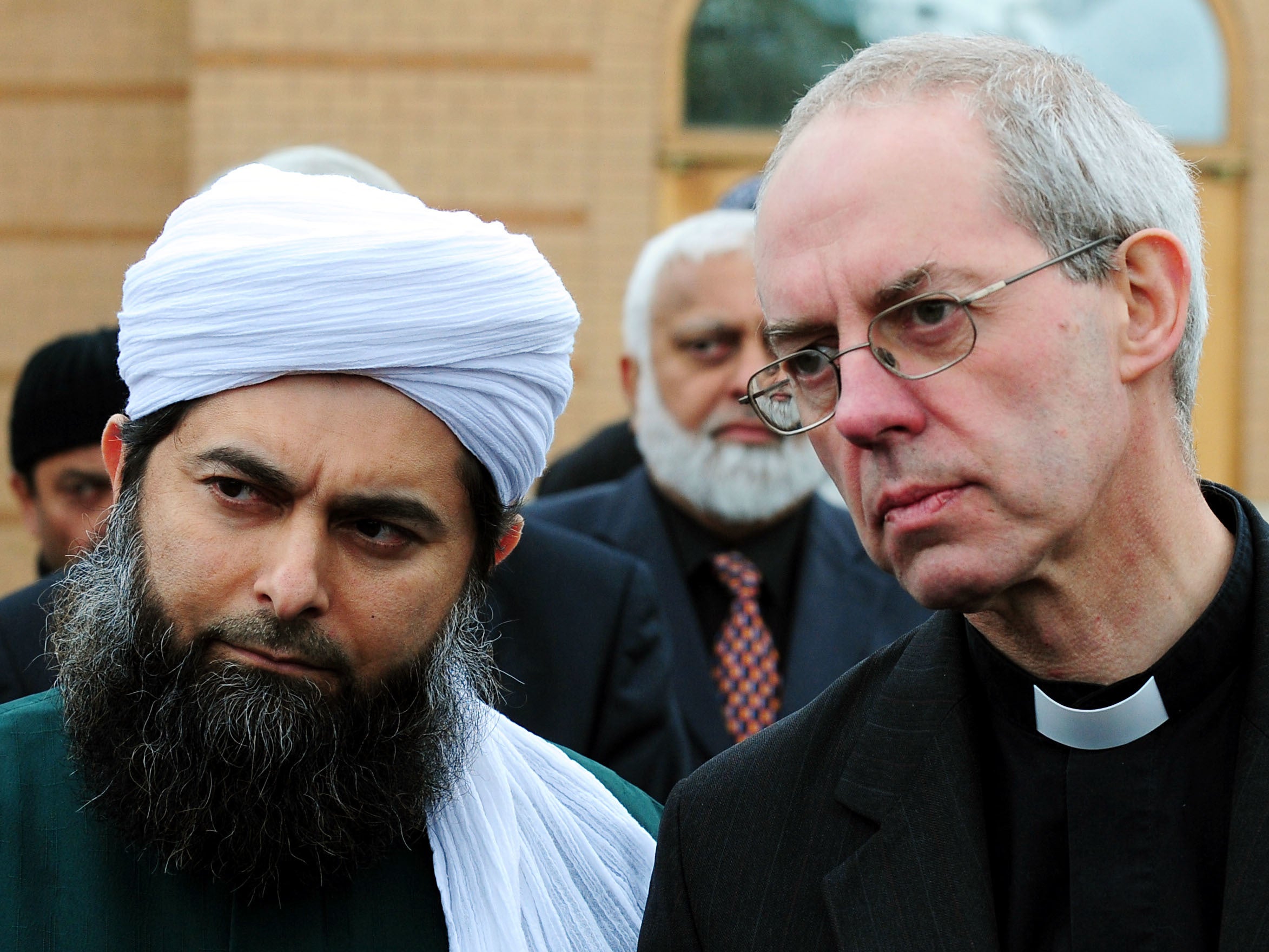 Senior imam Ibrahim Mogra alongside the Archbishop of Canterbury, Justin Welby