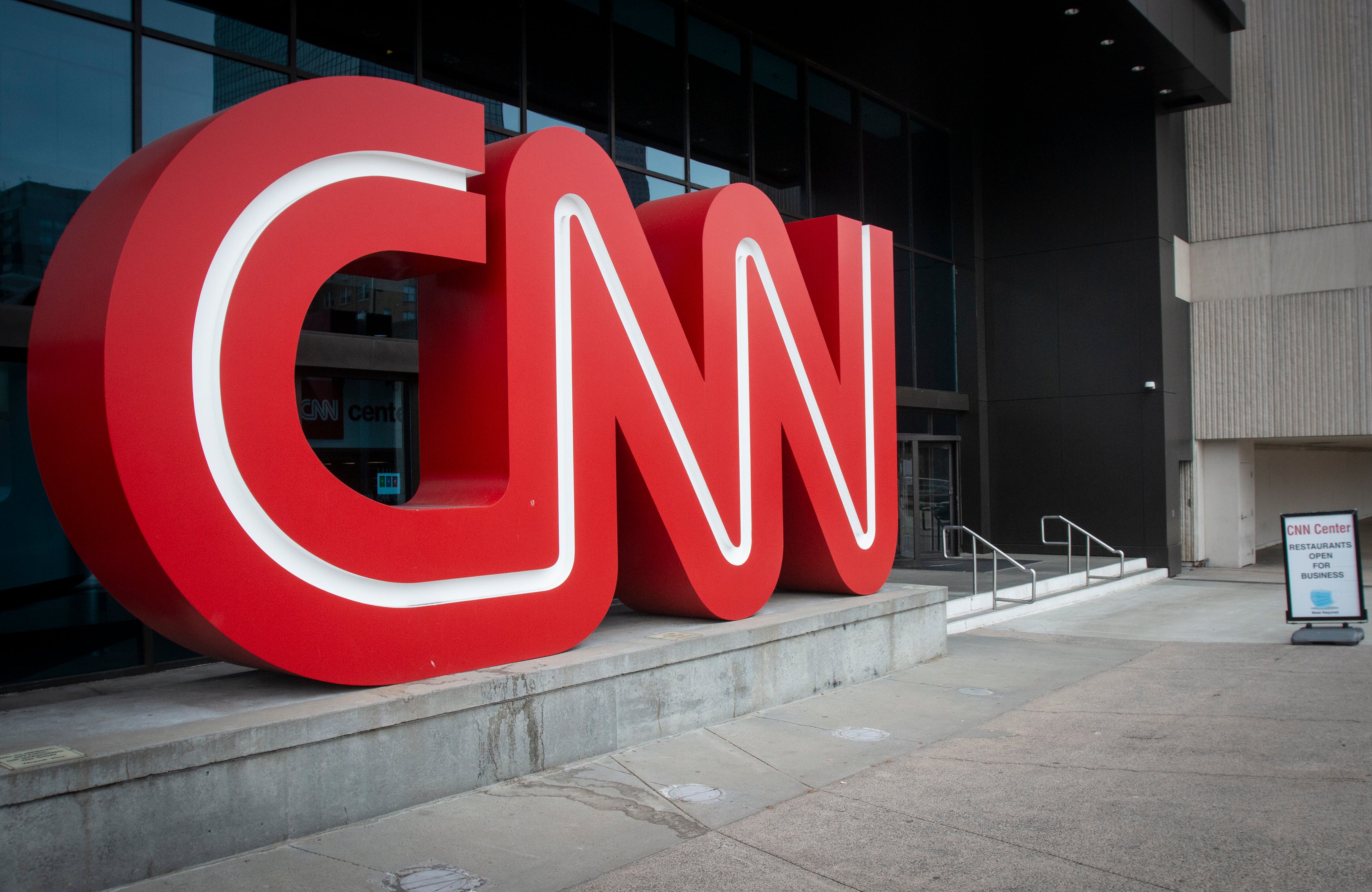 CNN is laying off hundreds of employees as it looks to reshape itself into a digital-first news organization.