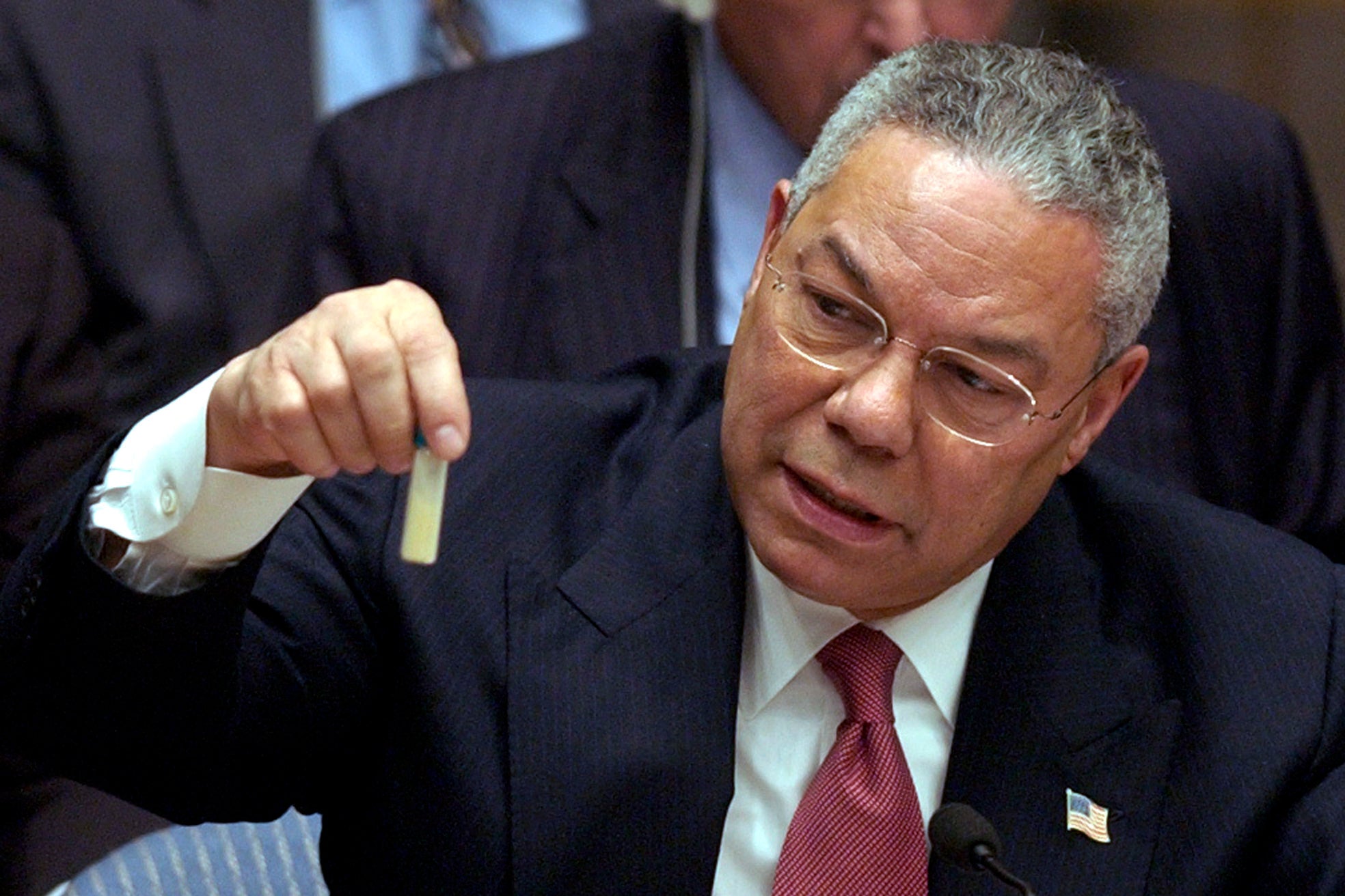 US Secretary of State Colin Powell holding a vial of what he said could have been a biological weapon during a meeting on the invasion of Iraq in the United Nations Security Council on Wednesday, Feb. 5, 2003.