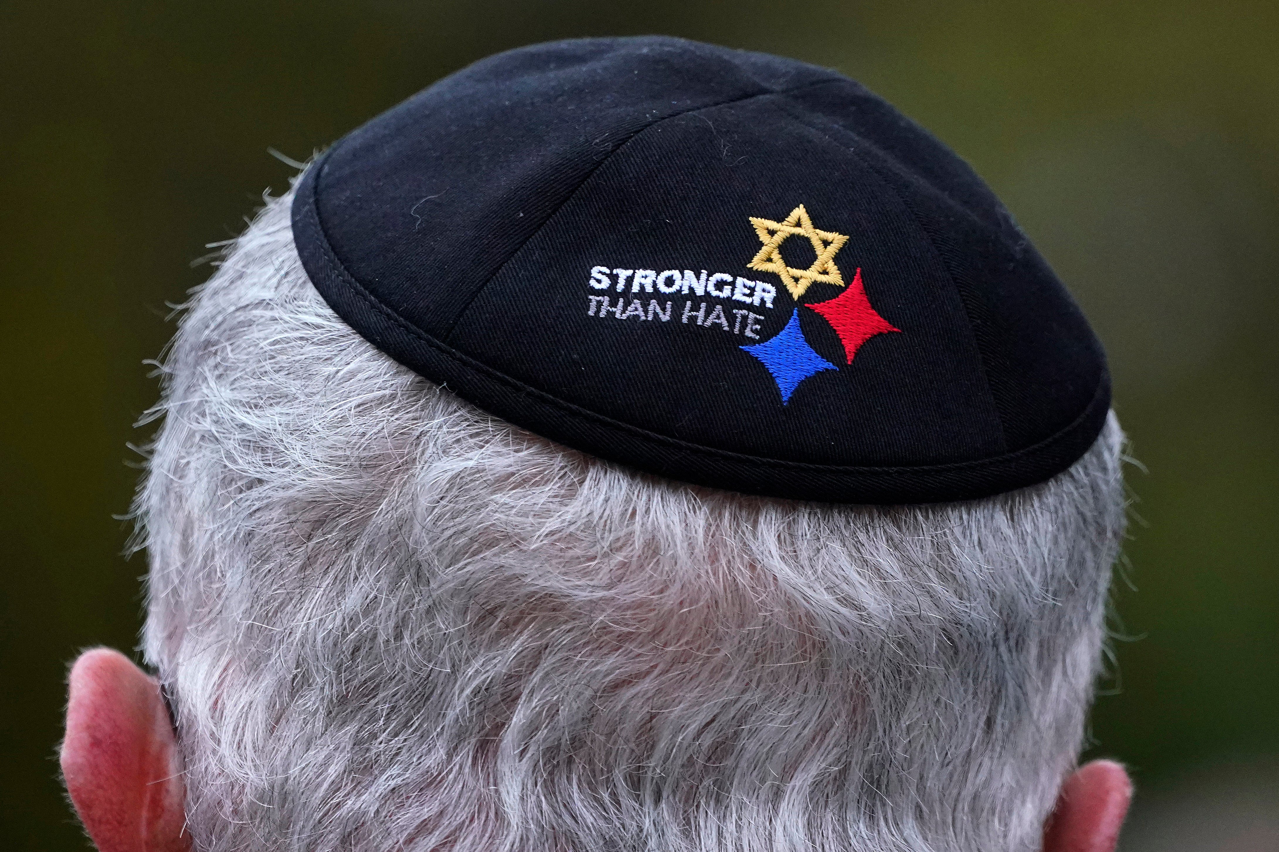 Tree of Life Synagogue Vice President Alan Hausman wears a Stronger Than Hate yarmulke during a Commemoration Ceremony in Schenley Park, in Pittsburgh's Squirrel Hill neighborhood, in 2021