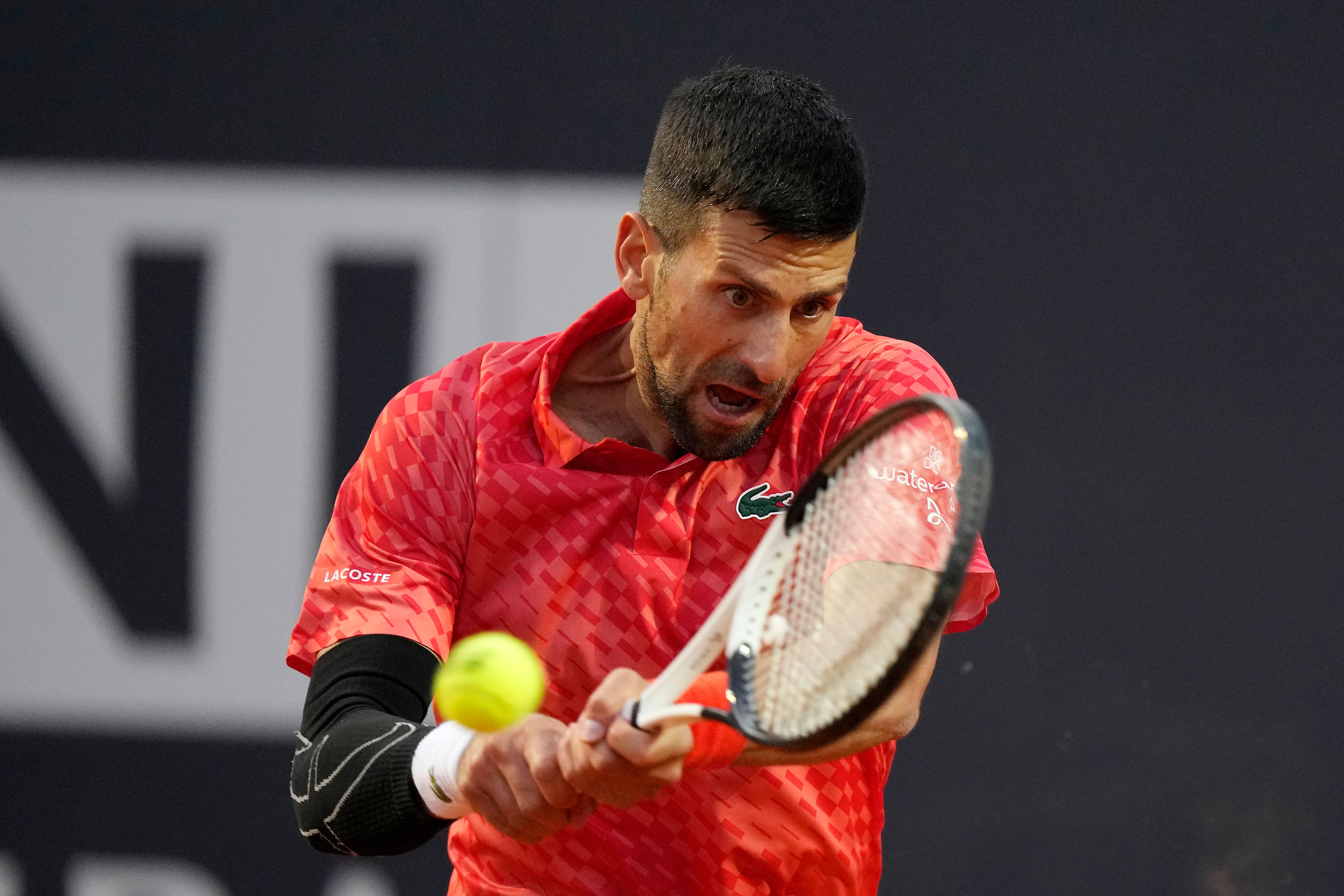 Novak Djokovic had strapping on his right elbow (Andrew Medichini/AP)