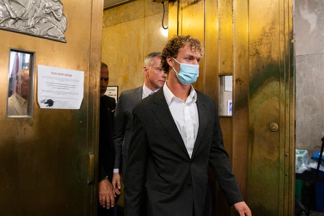 <p>Daniel Penny leaves Manhattan Criminal Court on Friday 12 May following his arraignment </p>