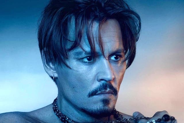 <p>Johnny Depp in promotional material for Dior Sauvage</p>