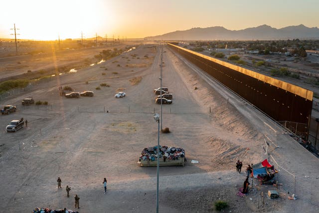 <p>A small group of migrants camping near El Paso, Texas on the US-Mexico border </p>