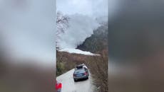 Moment hikers flee in terror as avalanche hurtles towards them