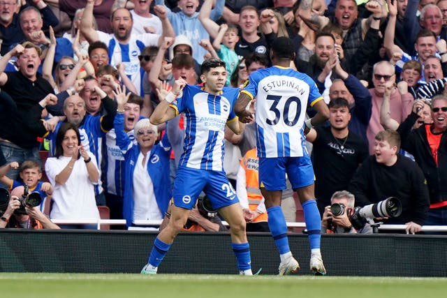 Brighton’s Julio Enciso (left) celebrates after opening the scoring at Arsenal (Tim Goode/PA)
