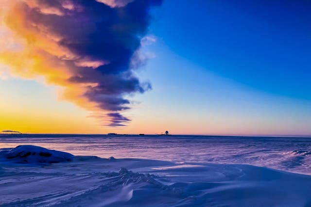 <p>Peaceful sunrise at Oliktok Point in February 2021 when Sandia National Laboratories researchers began collecting the first-ever dataset from the Arctic seafloor</p>