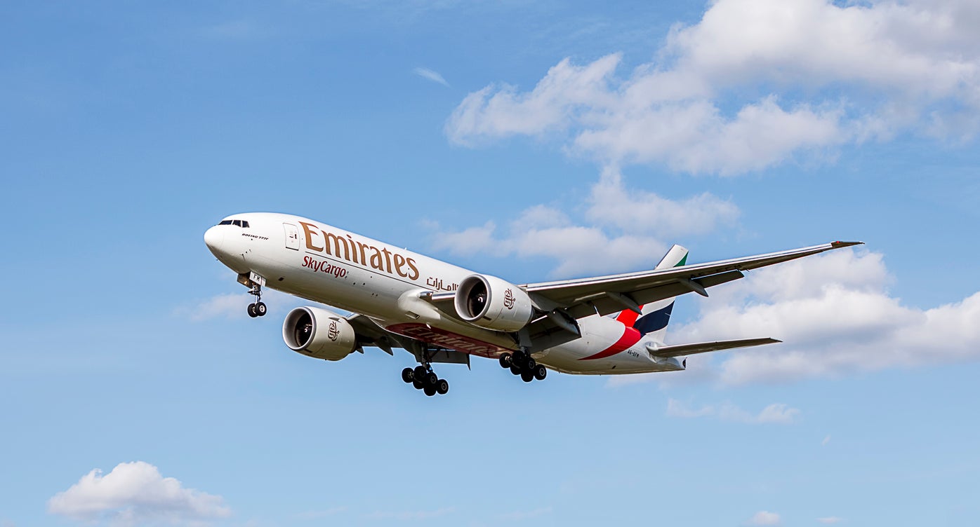 An Emirates plane on approach to Heathrow Airport