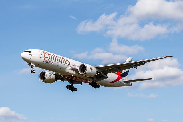 <p>An Emirates plane on approach to Heathrow Airport</p>