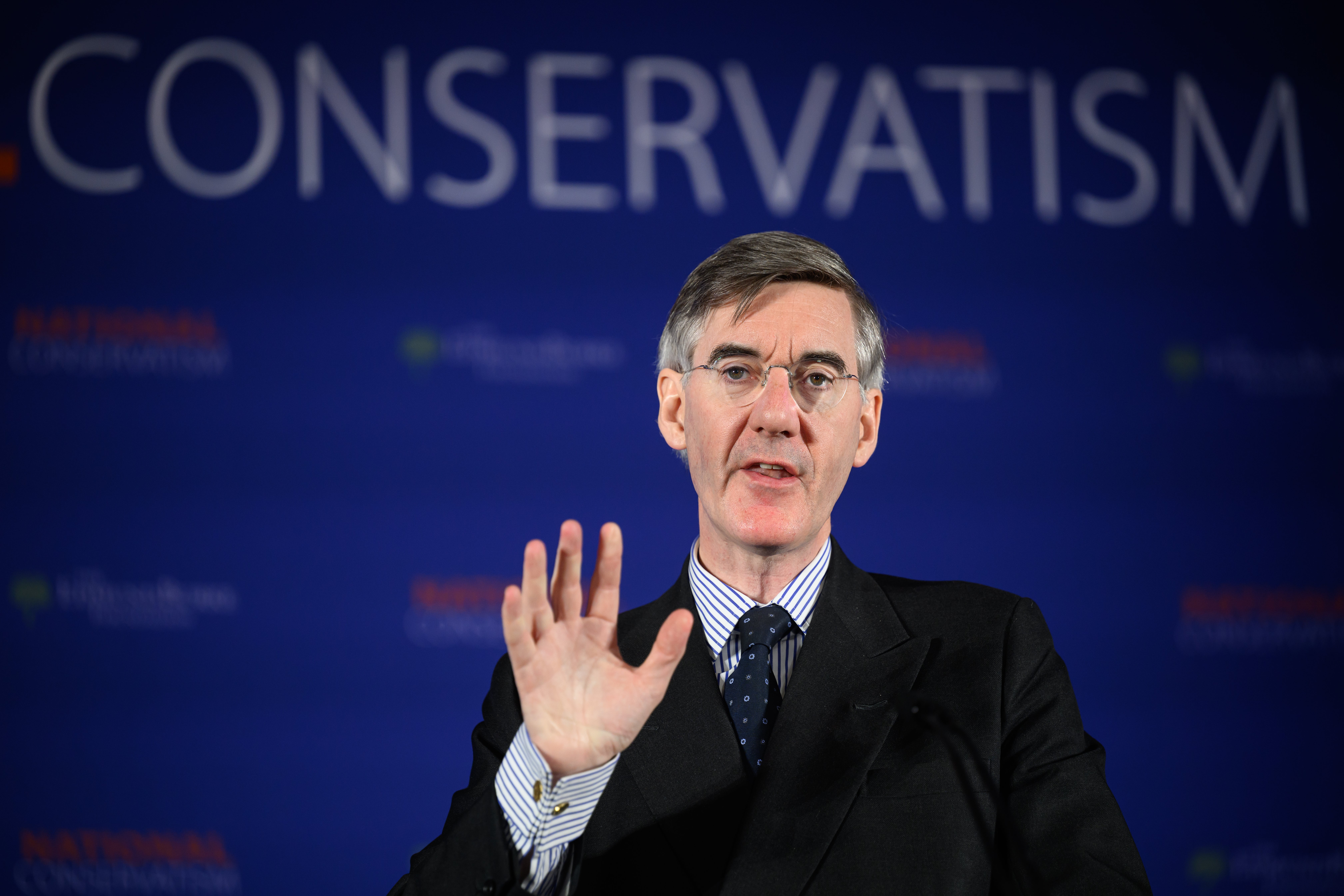 Conservative MP Jacob Rees-Mogg delivers his keynote address during the National Conservatism conference.