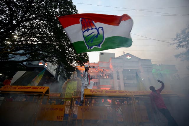 <p>Supporters of the Congress party celebrate their victory in the Karnataka assembly election, in the southern city of Bengaluru</p>