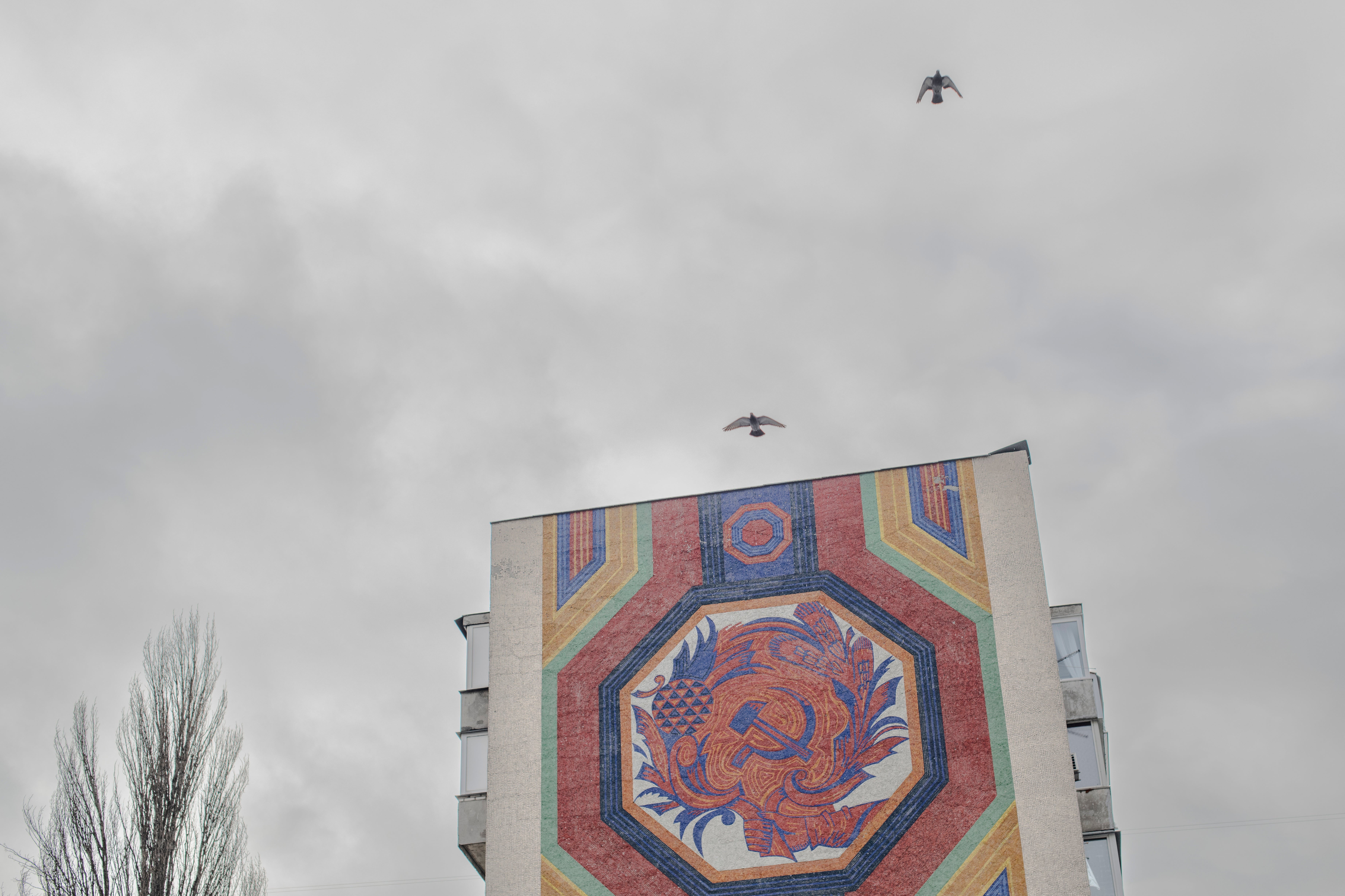 Soviet mosaics are all over Kyiv, etched into apartment buildings, bus stops and schools