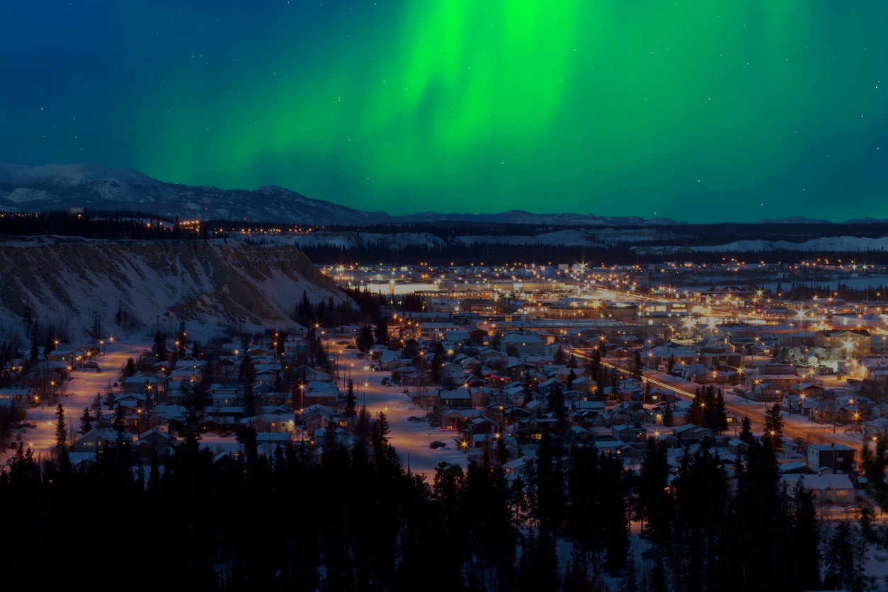 A view of the aurora borealis over downtown Whitehorse