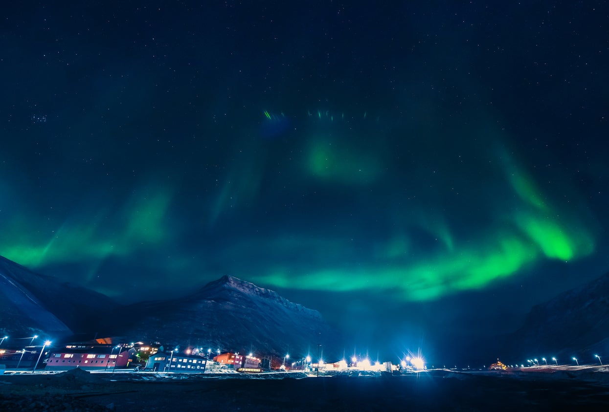 The Northern Lights over Longyearbyen, the main city in Svalbard