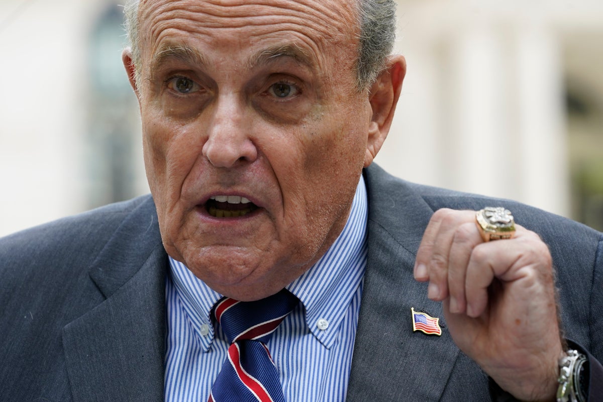 Woman sues Rudy Giuliani, saying he coerced her into sex, owes her $2 million in unpaid wages