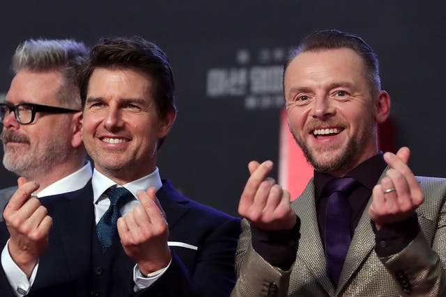 <p>Tom Cruise (left) and Simon Pegg</p>