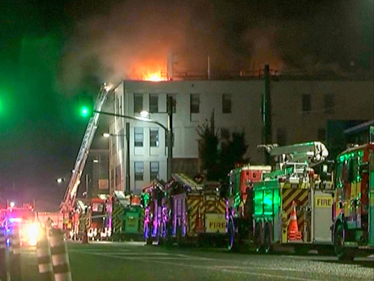 Wellington hostel fire – live: At least six killed and others missing after blaze in New Zealand capital