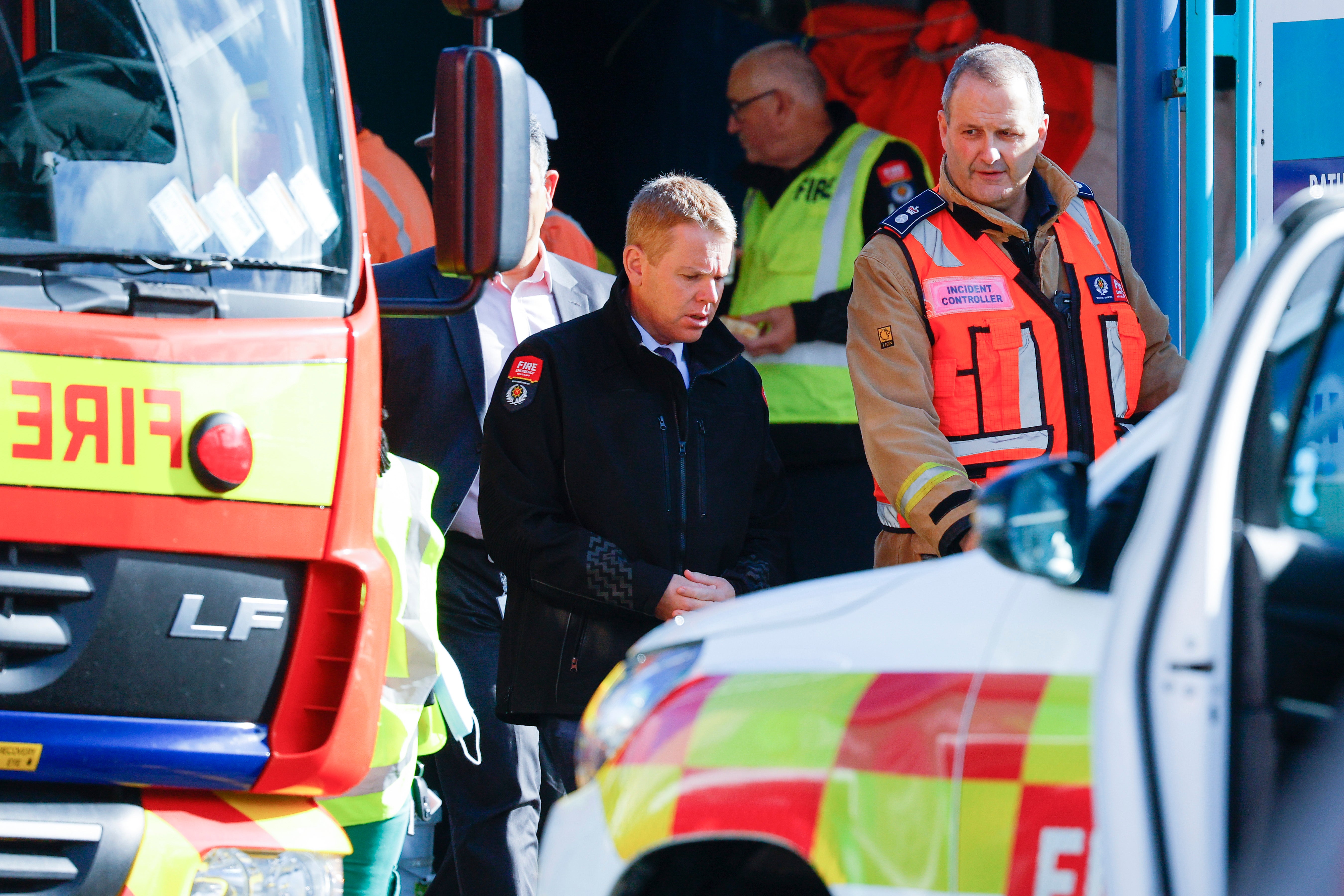 Prime Minister Chris Hipkins arrives at the scene after a fire at Loafers Lodge