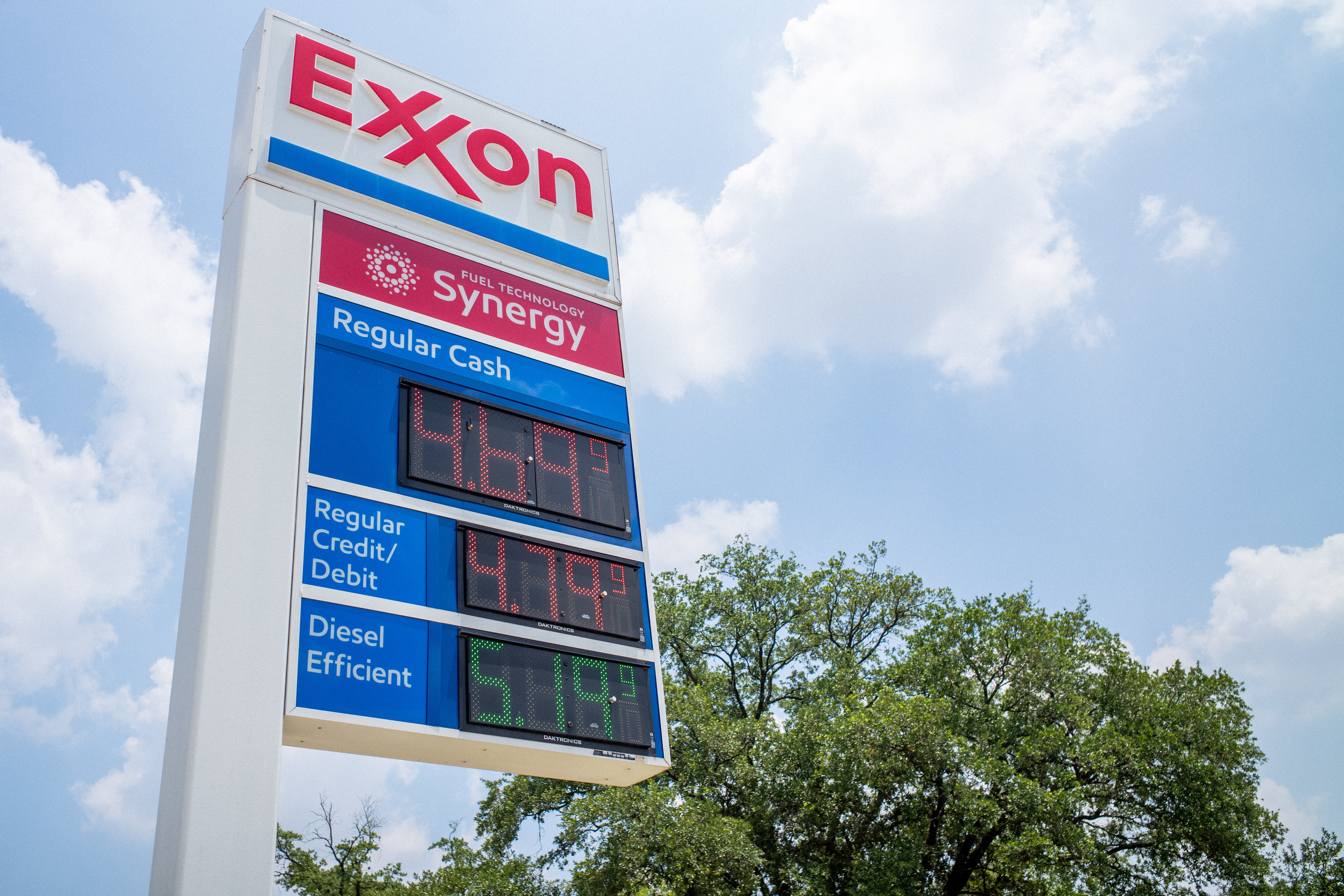 Gas prices are seen on an Exxon Mobil gas station sign on 9 June 2022 in Houston, Texas