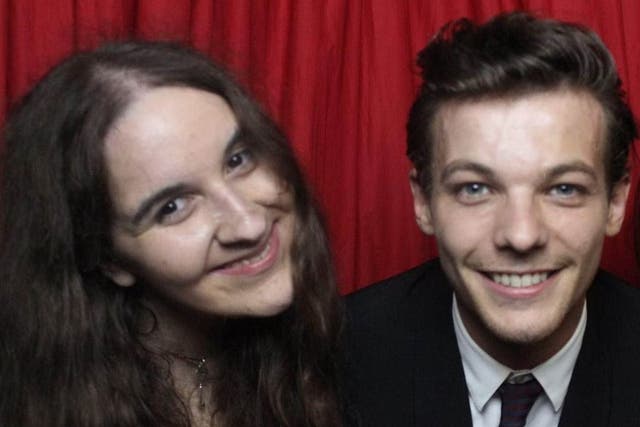 <p>The late Megan Bhari, with Louis Tomlinson of One Direction </p>