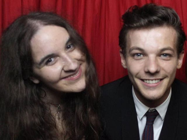 <p>The late Megan Bhari, with Louis Tomlinson of One Direction </p>