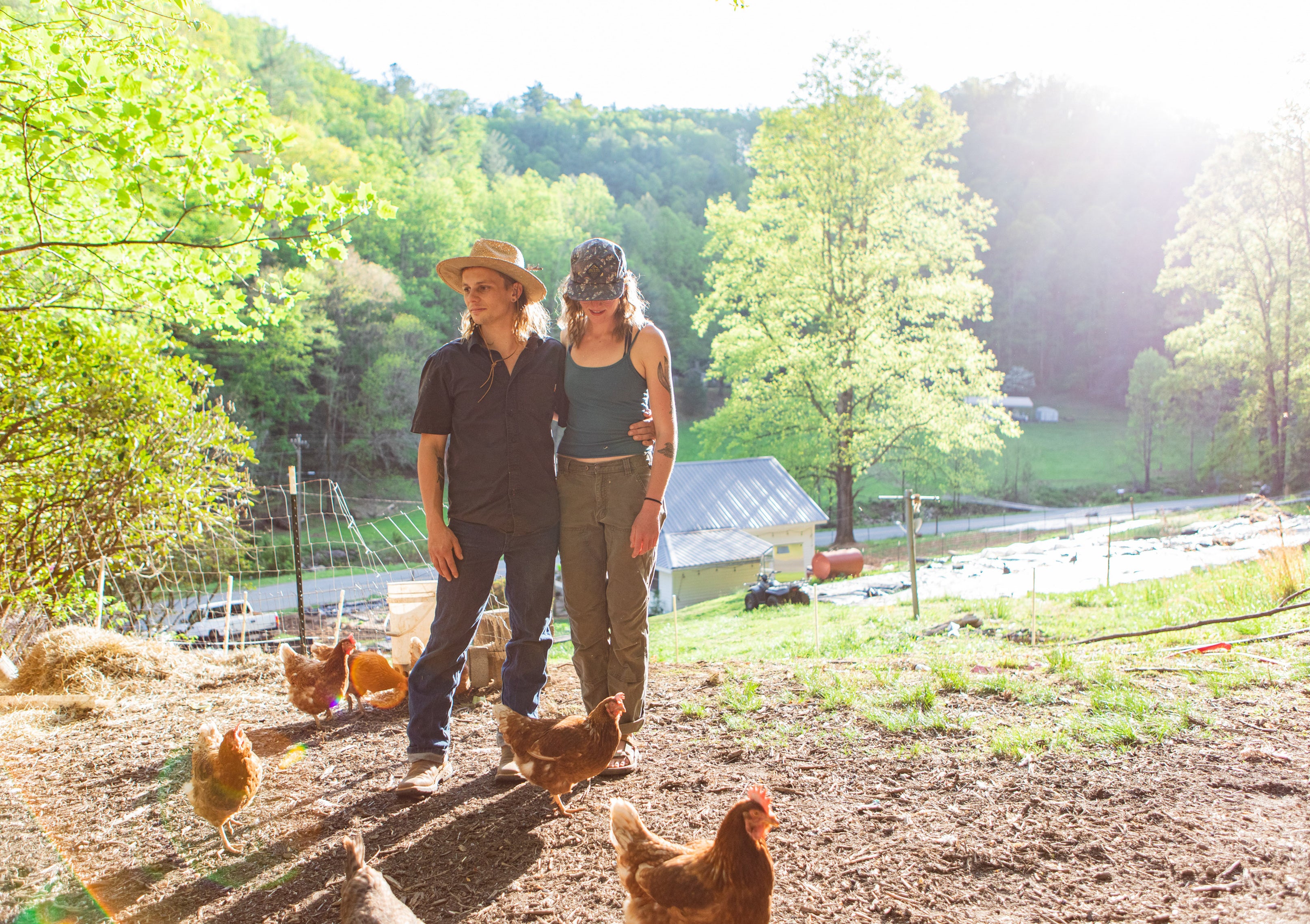 Alex O’Neill, left, and Jess McClelland on their 16-acre property in Triplett, North Carolina