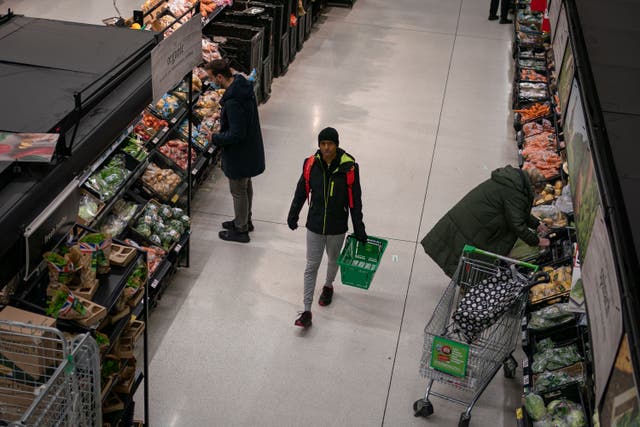 The SNP called on ministers to press retailers to pass on falling wholesale prices to customers (Aaron Chown/PA)