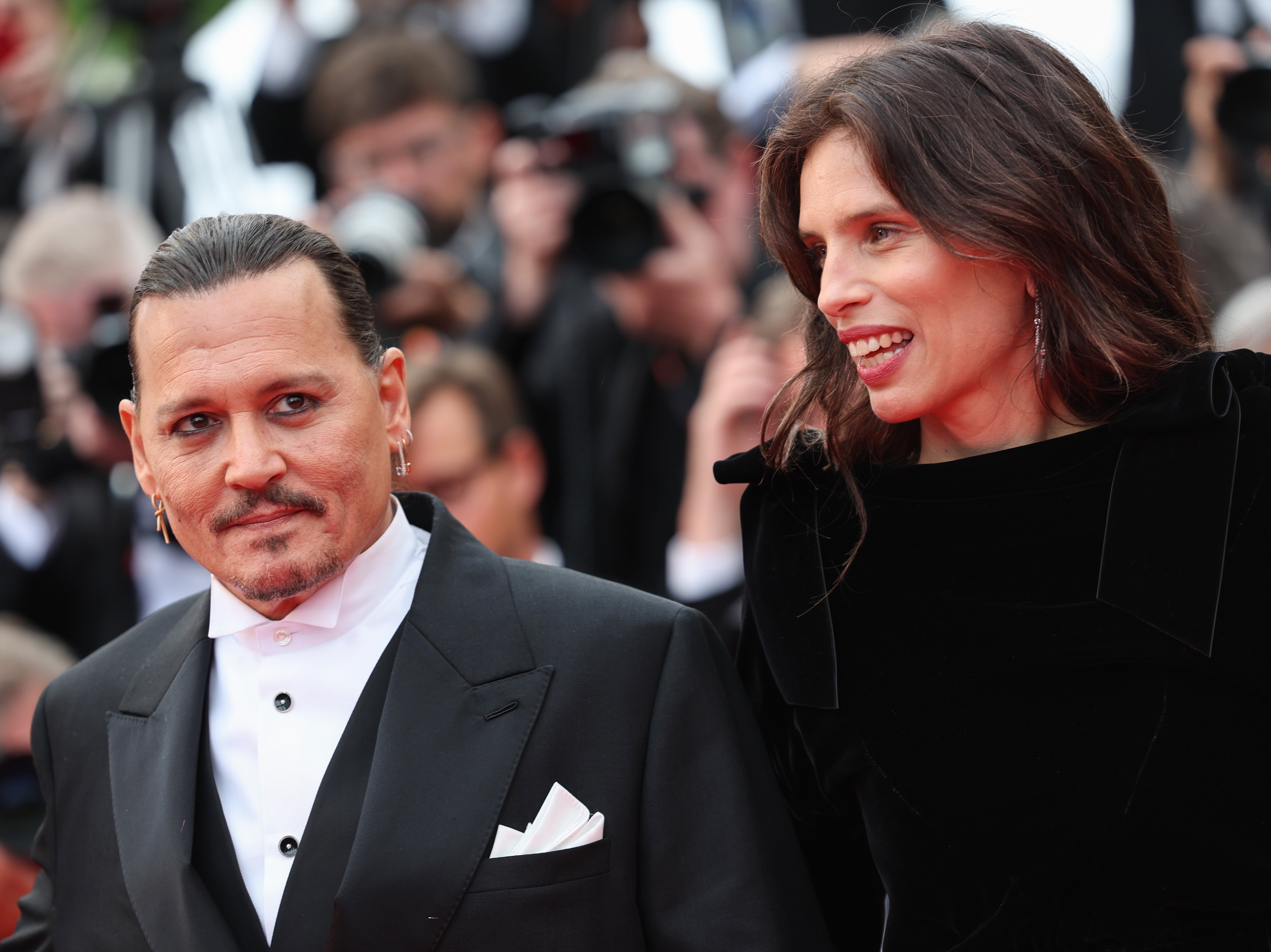 Johnny Depp and Maïwenn attend the ‘Jeanne du Barry’ screening and opening ceremony red carpet at the 76th annual Cannes film festival