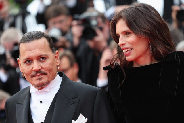 <p>Johnny Depp and Maïwenn attend the ‘Jeanne du Barry’ screening and opening ceremony red carpet at the 76th annual Cannes film festival</p>