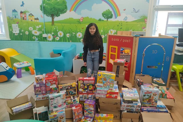 Rhea with some of the toys she donated (Epson and St Helier University Hospitals/PA)