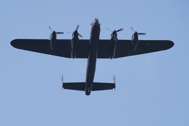 The UK’s only airworthy Lancaster bomber, PA474, takes part in the Royal Air Force Battle of Britain Memorial Flight flypast over Hendon (Jonathan Brady/PA)