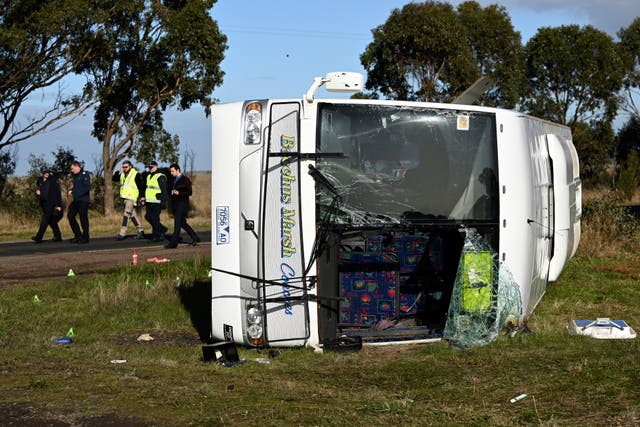 <p>Investigators work at the scene of a bus crash near in Melbourne, Wednesday, May 17, 2023.</p>