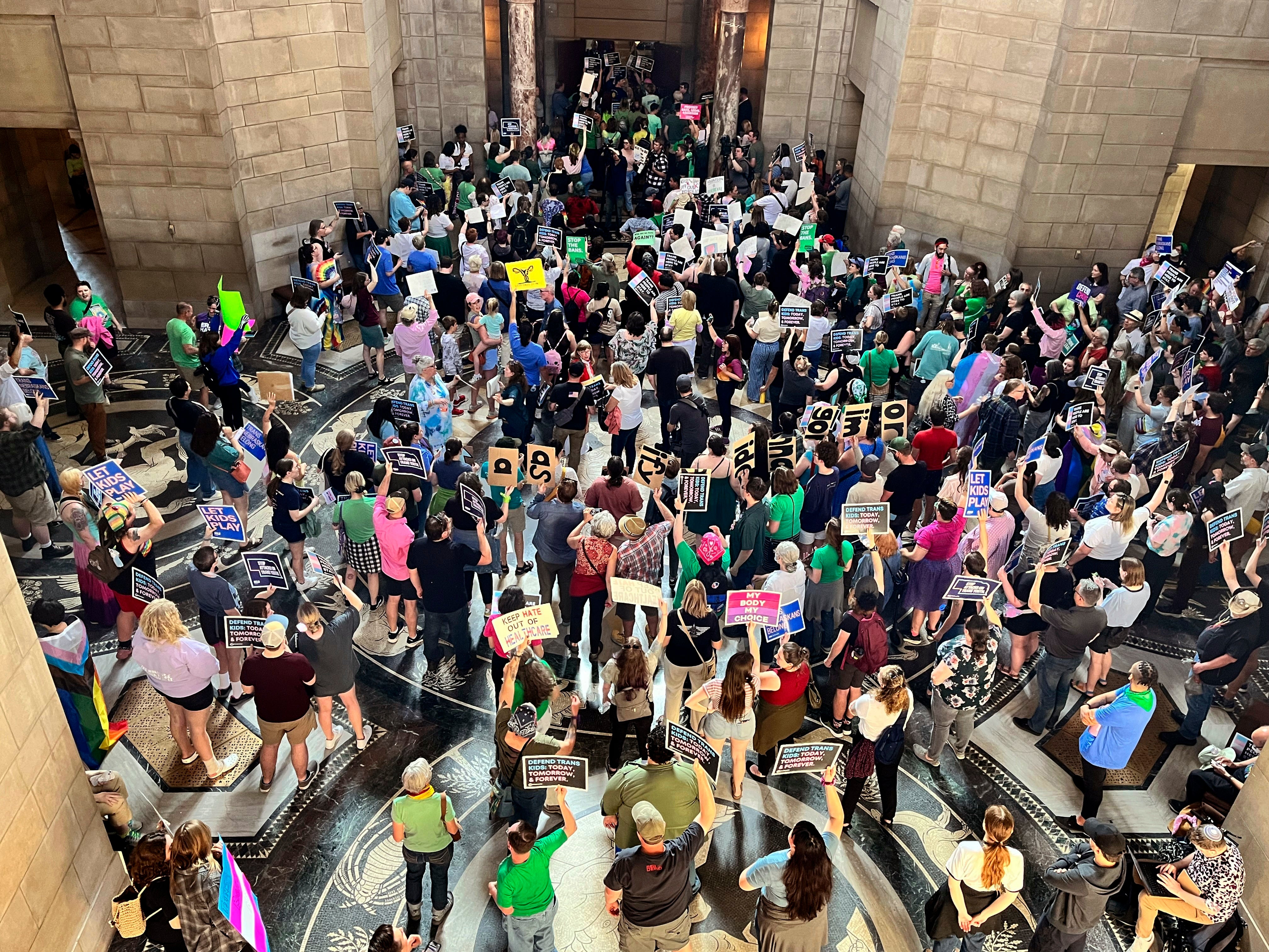 Hundreds of people filled the Nebraska Capitol in Lincoln on 16 May chanting ‘one vote to save our lives’ in protest of a measure targeting abortion rights and gender-affirming care for trans youth.