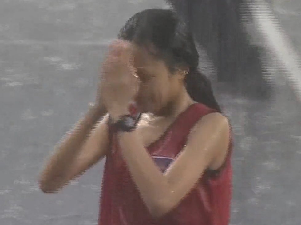 Video of Cambodian runner Bou Samnang finishing 5000m race in pouring rain has won hearts