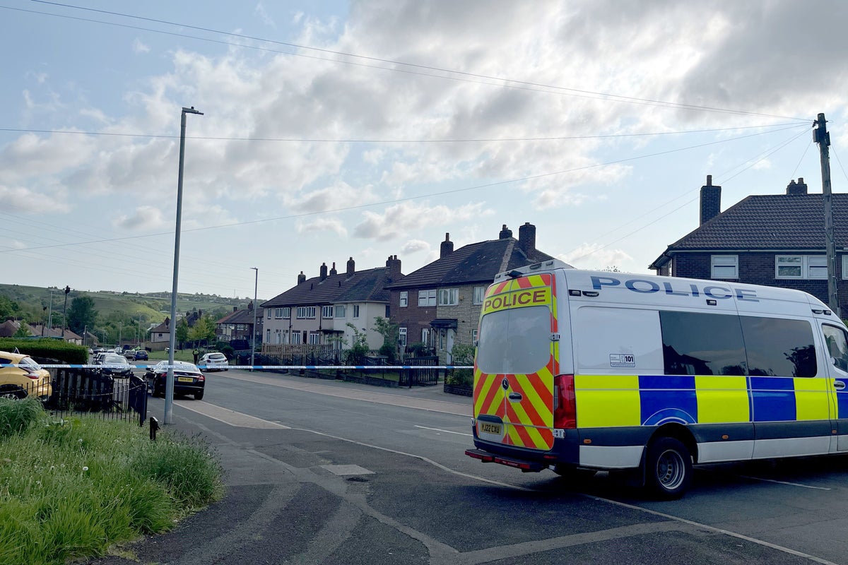 Man remanded on murder charges after pair found dead in Huddersfield ...