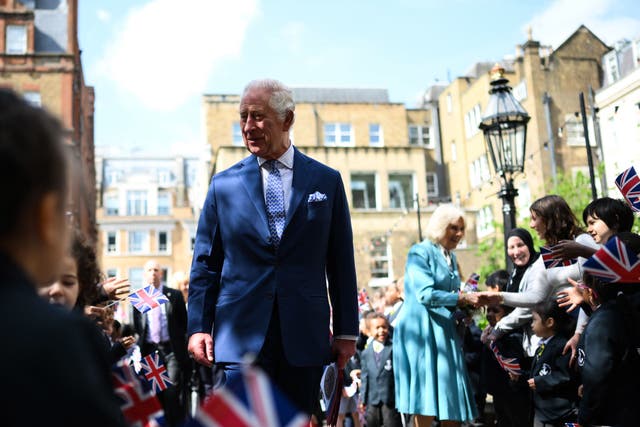 The King and Queen in Covent Garden (Daniel Leal/PA)
