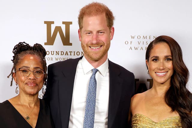 <p>Doria Ragland, Prince Harry and Meghan Markle claimed they were followed by six blacked-out vehicles </p>