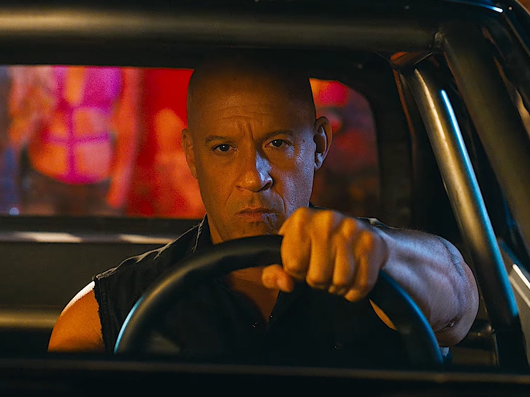 <p>Vin Diesel behind the wheel of a vehicle in ‘Fast X'</p>