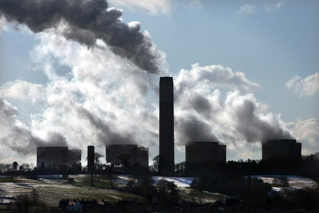 Smoke rising out of chimneys at Ratcliffe on Soar power station near Nottingham as calls from environmentalists over global warming increase (David Jones/PA)