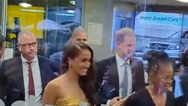 <p>Prince Harry and Meghan Markle arrive at a New York charity event before the 'near catastrophic' car chase</p>