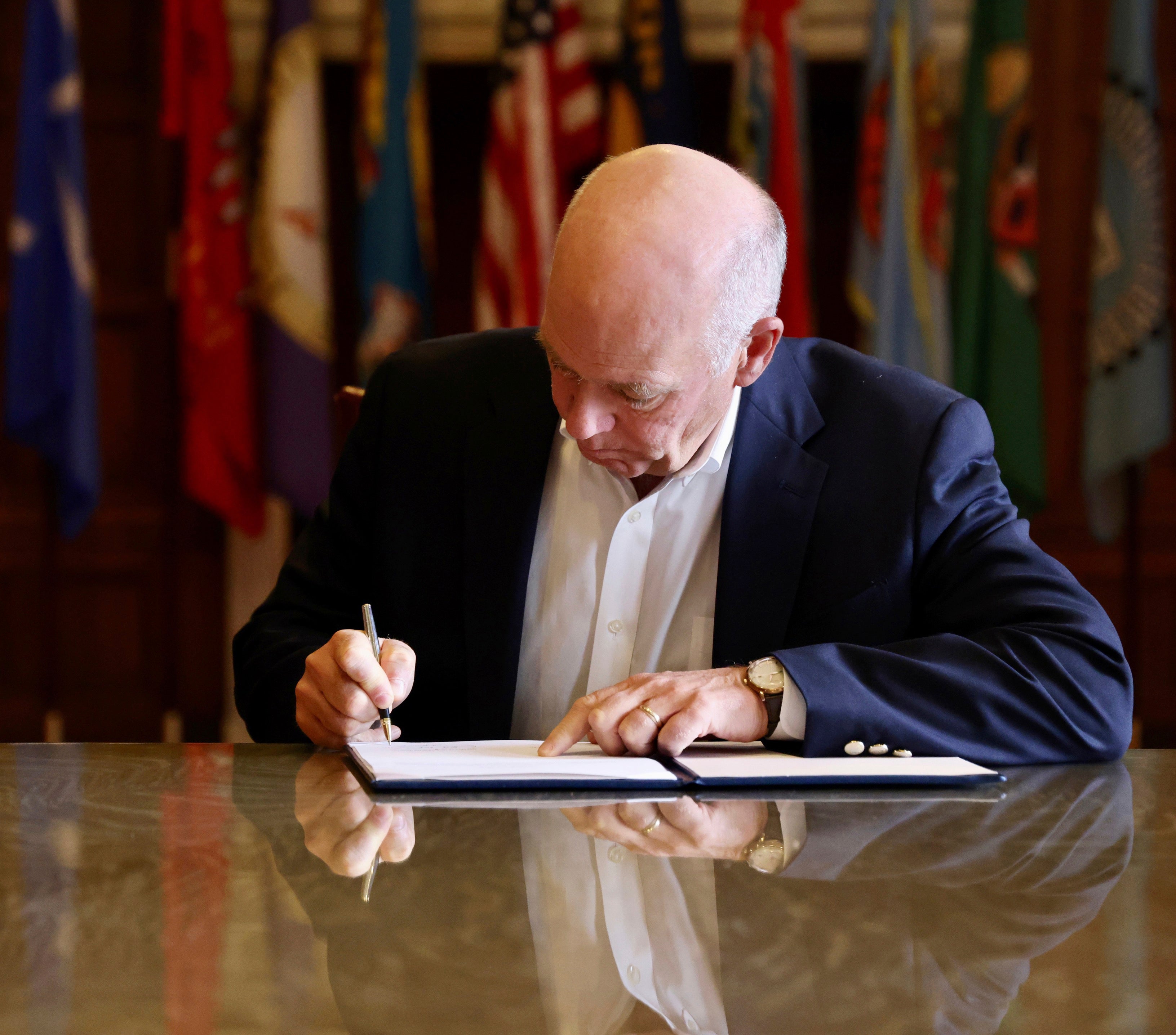 <p>Republican Gov. Greg Gianforte signs a law on 17 May, 2023, which will ban TikTok in the state of Montana from January 2024 </p>